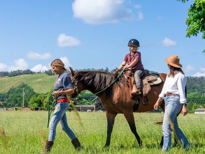 child horseback riding
