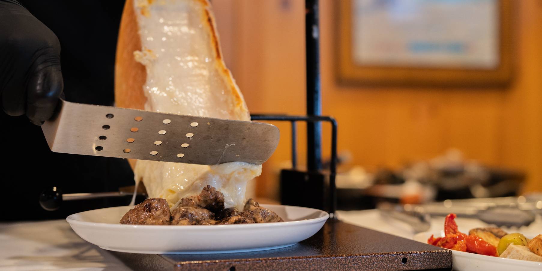 Adding cheese to dish