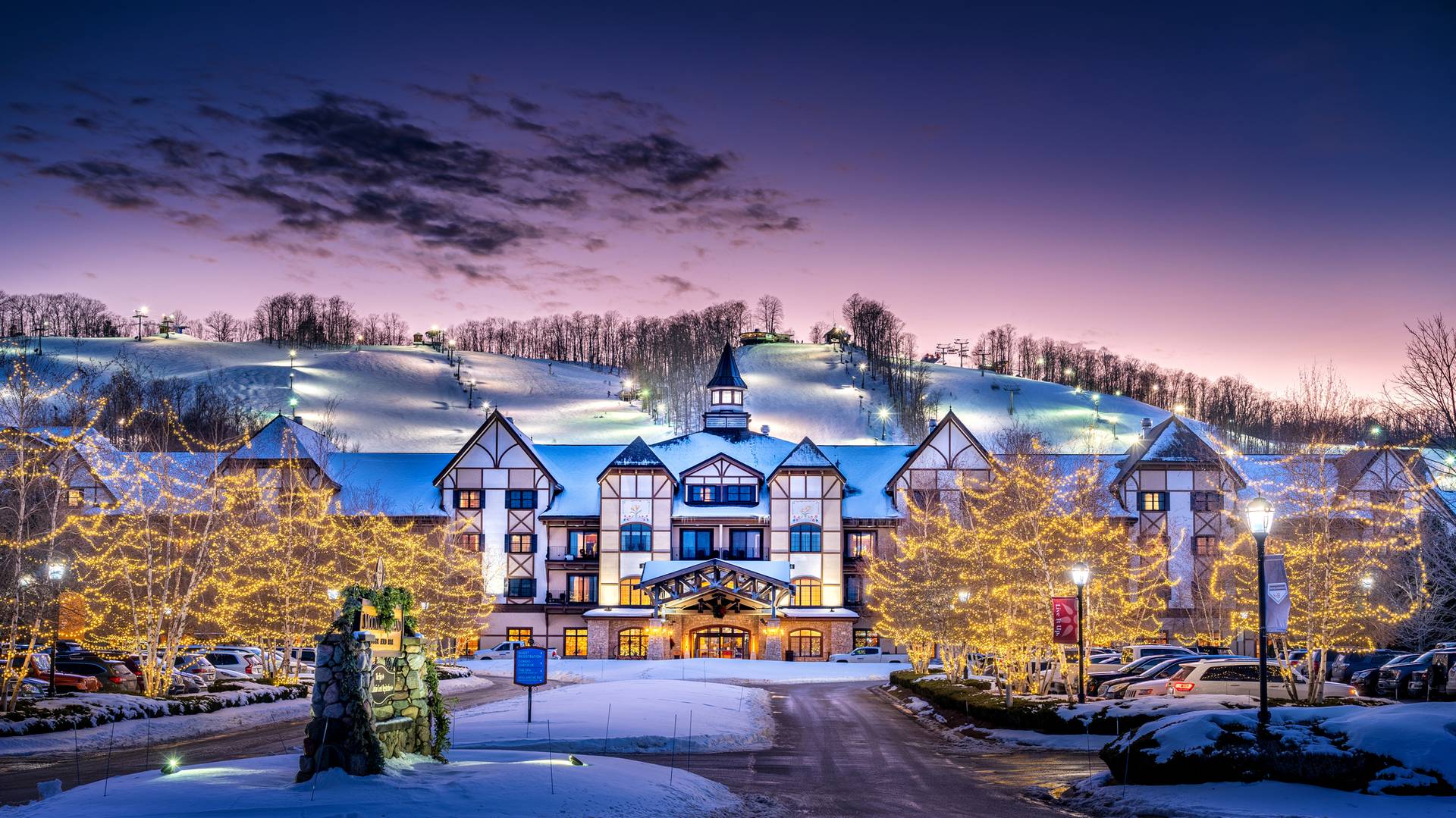Mountain Grand Lodge and Spa in the winter all lit up with Christmas lights.