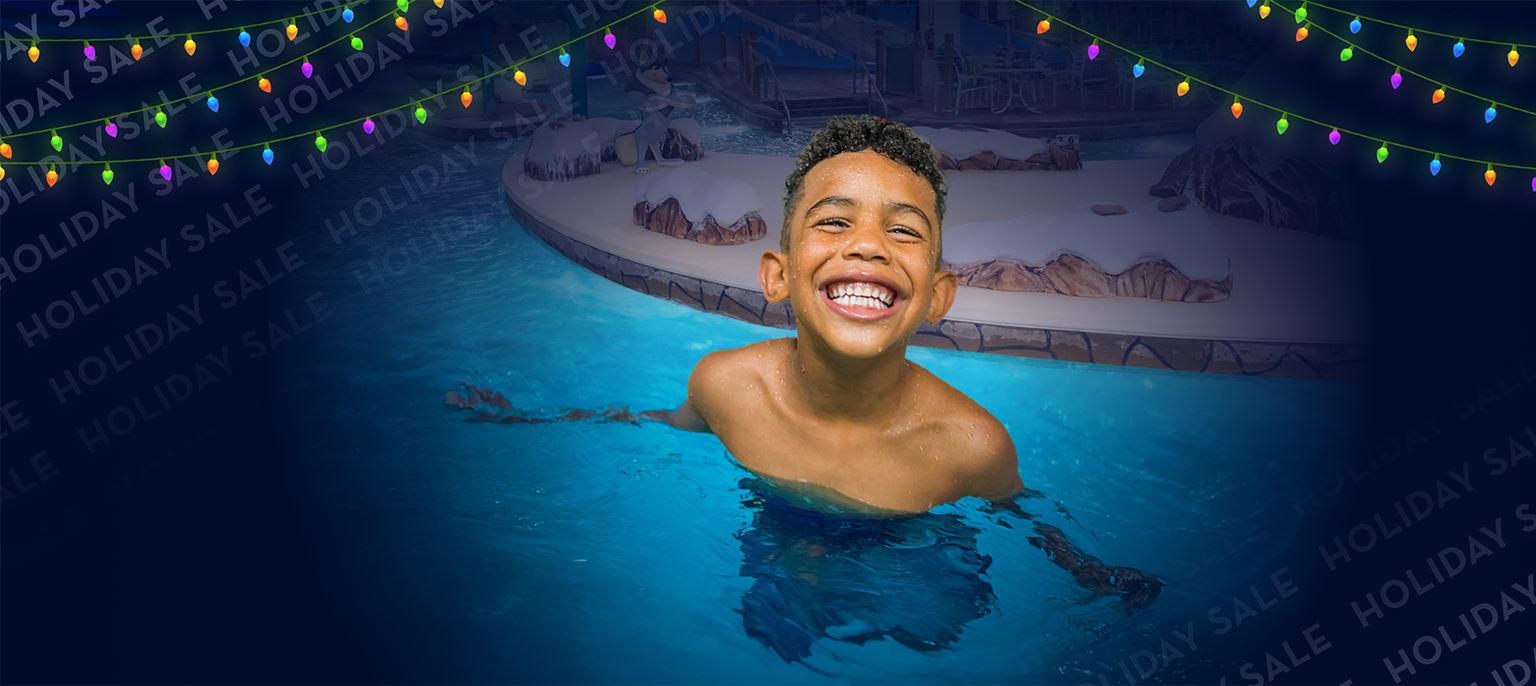 kid in the pool for waterpark after dark