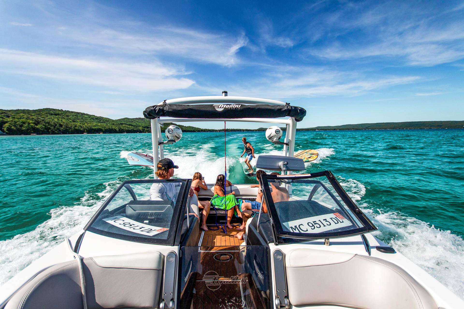 group of people wakesurfing