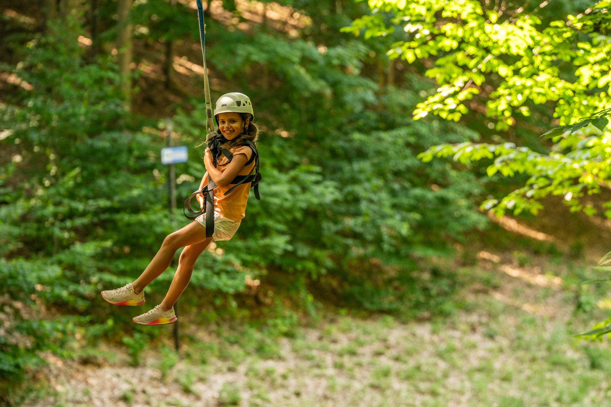 girl smiling on zipline tour