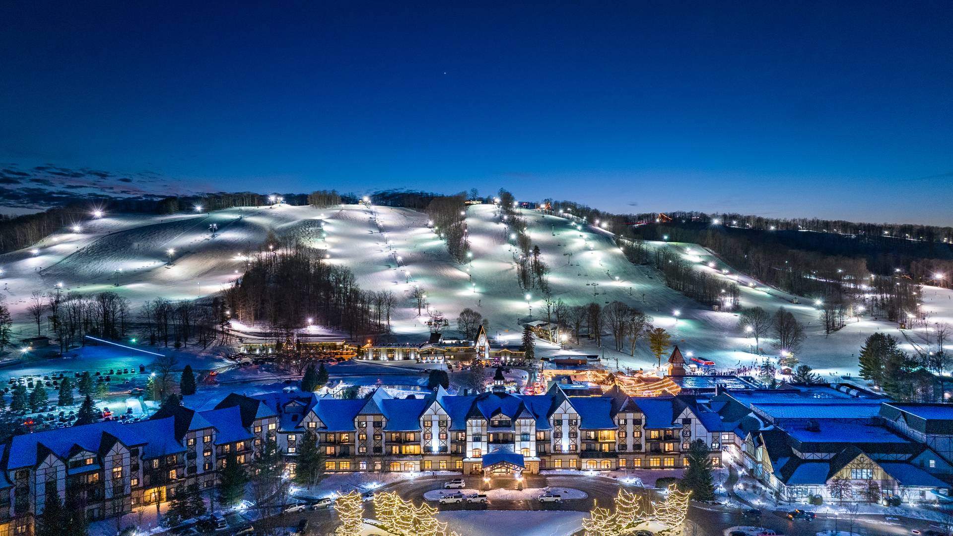 Boyne resort overview with the mountain lit up in the background