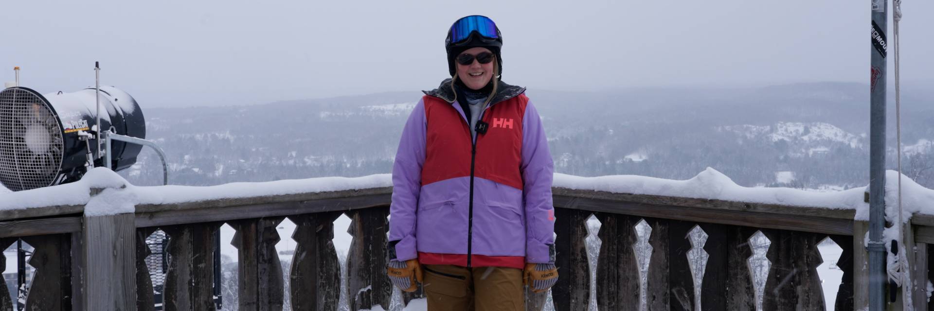 Woman standing with Mountain in background