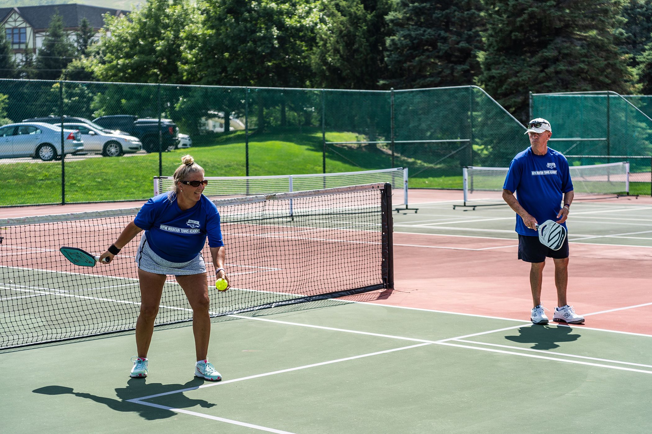 Couple playing pickleball