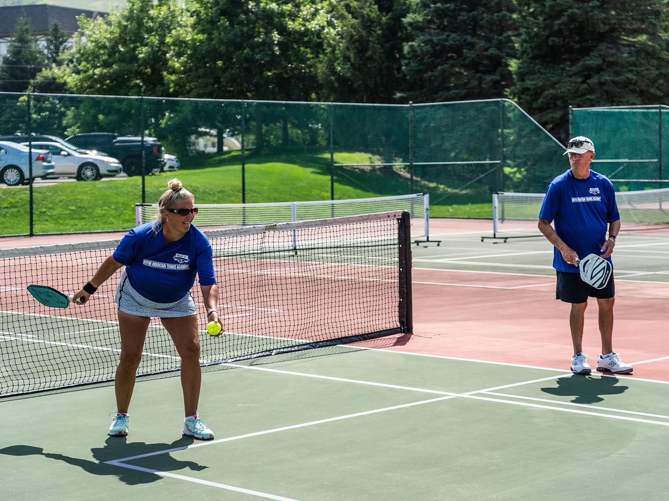 Couple playing pickleball