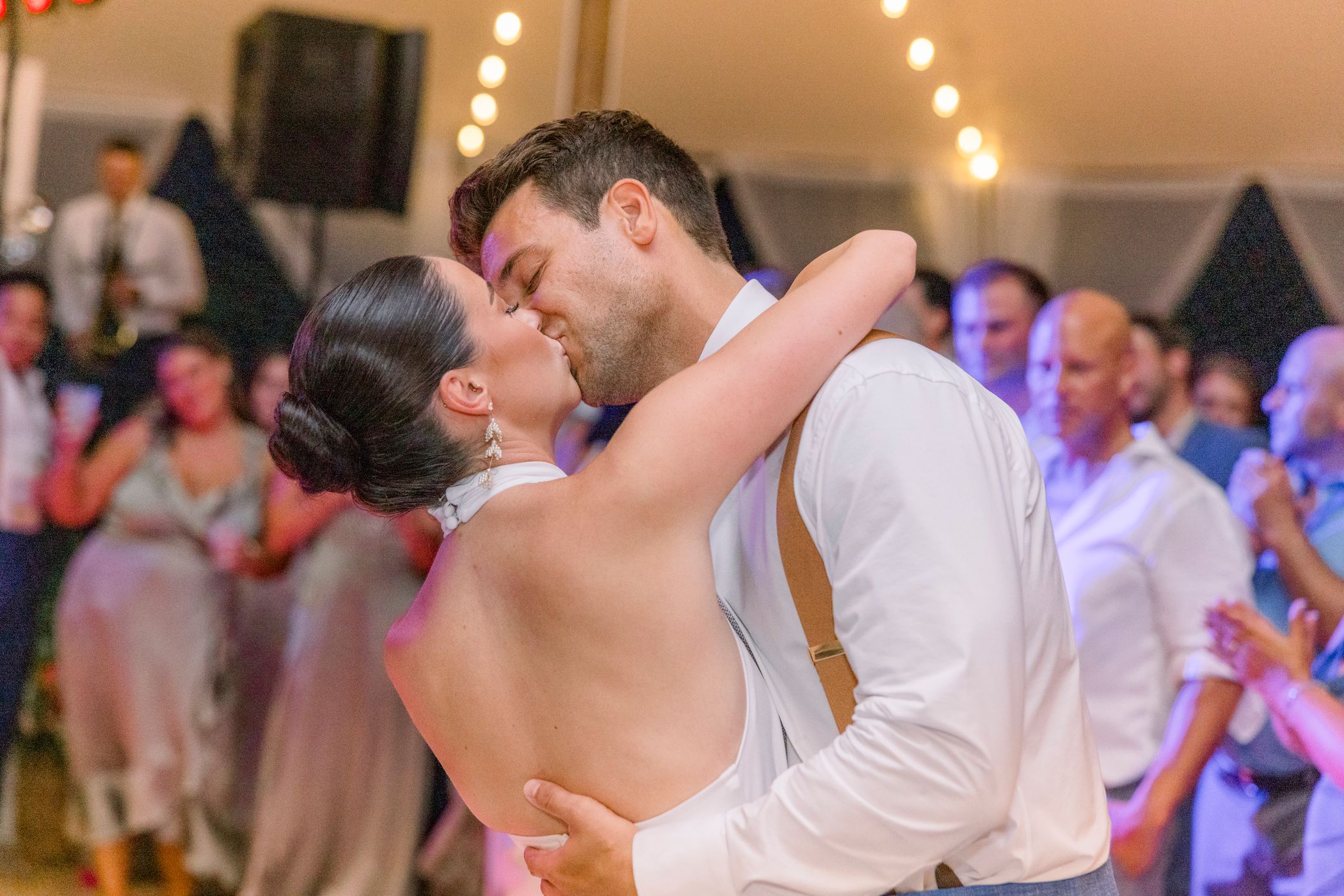 couple kissing on dance floor