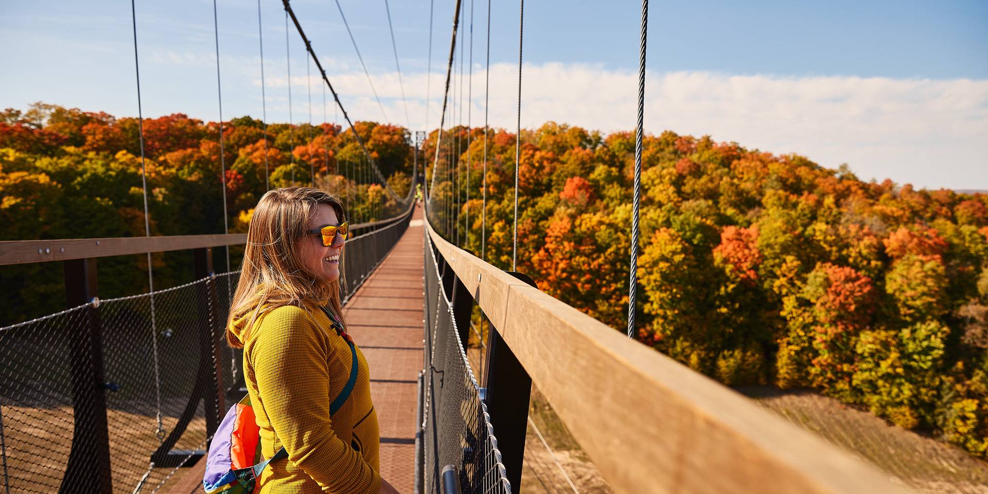 Lady looking at fall colors on SkyBridge