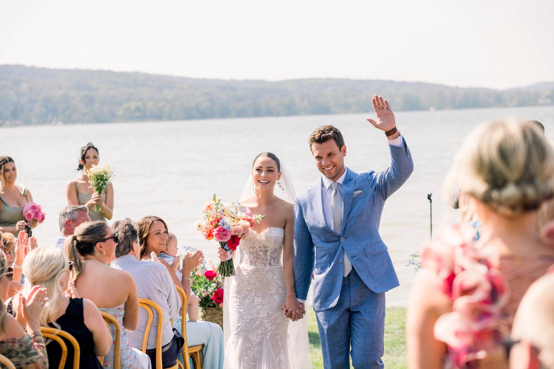 newlywed couple walking down the aisle