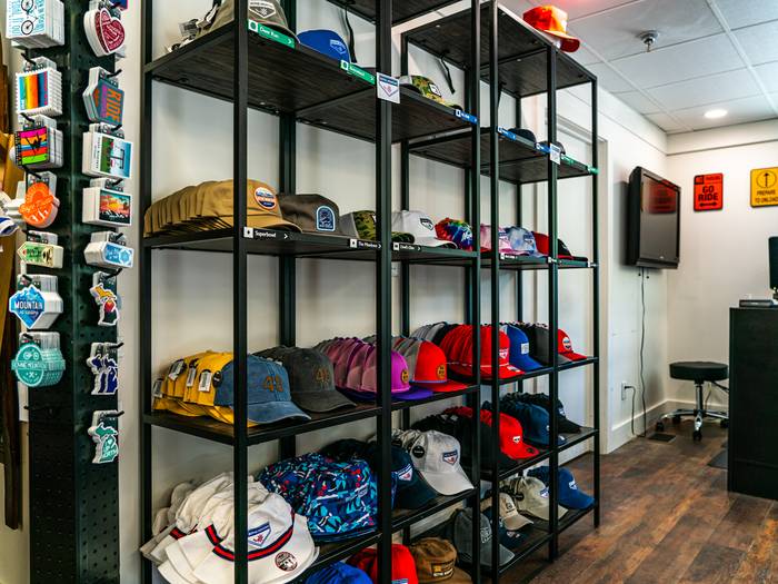 logo shop hat wall