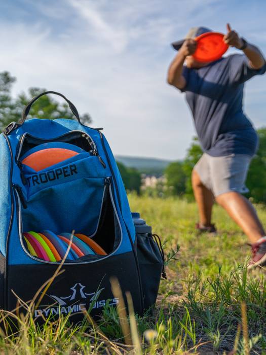 person disc golfing
