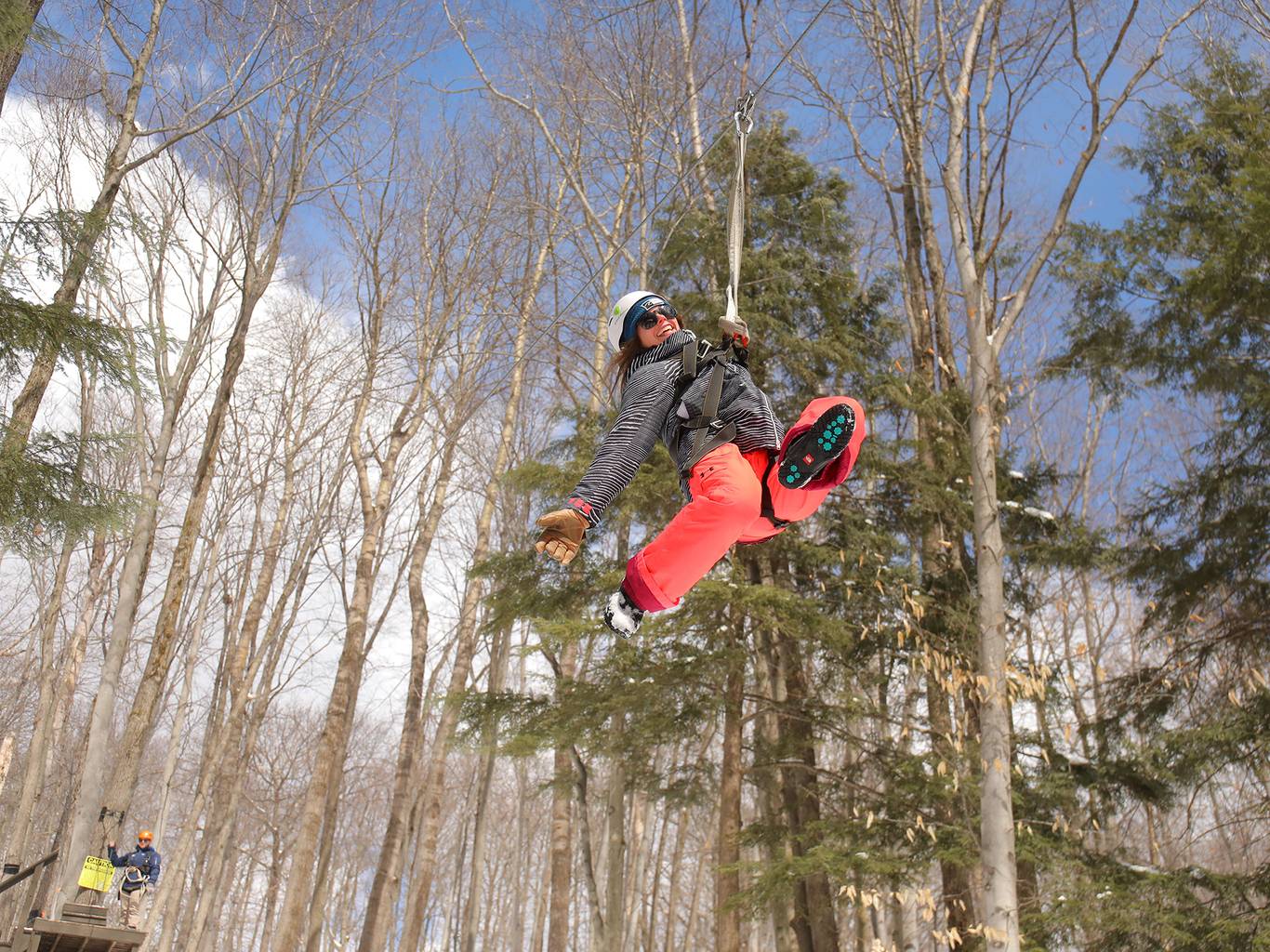 Lady ziplining in the winter