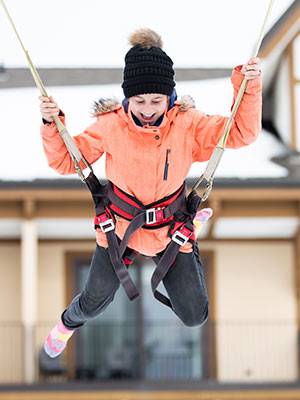 Kids Fest at Boyne Mountain - kid on high jump bouncer