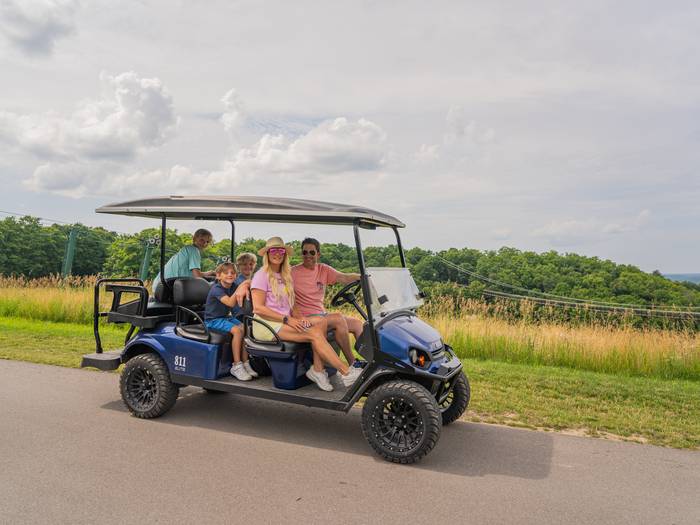 Family on Golf Cart