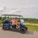 family on scenic cart