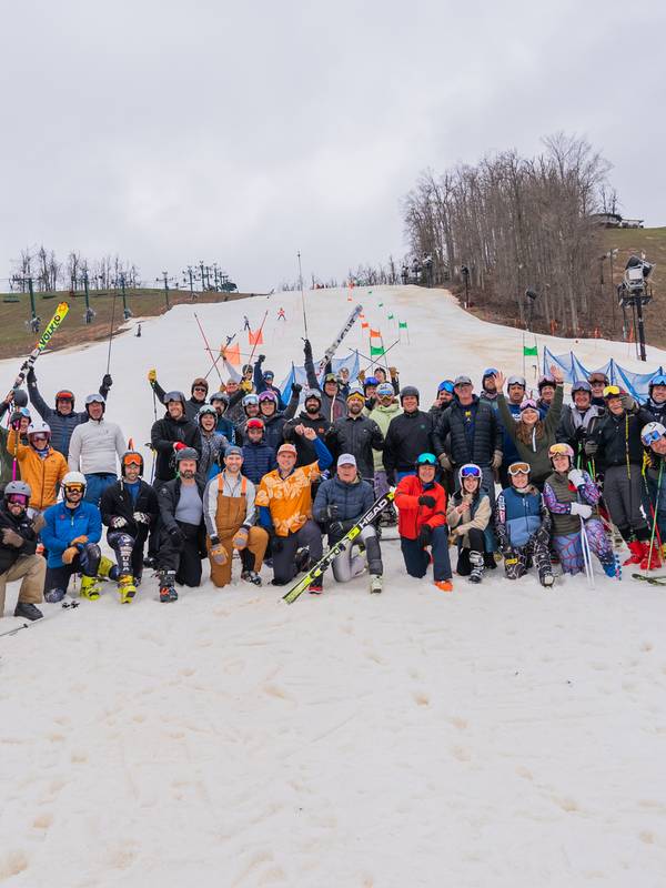 Group of Hemlock Open participants in front of Slalom Ski Race course
