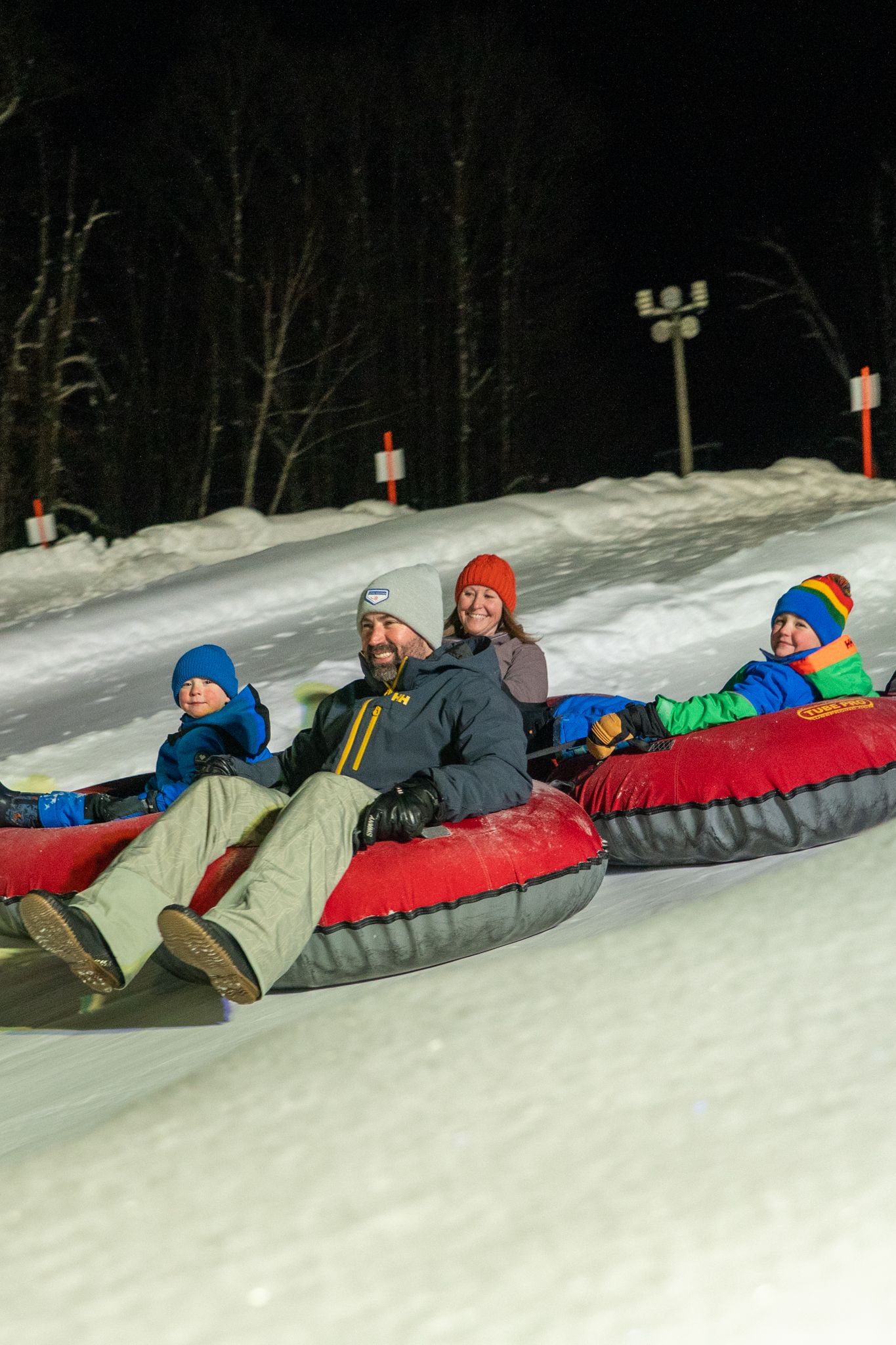 family tubing in the evening