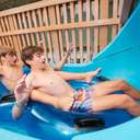 two kids on a waterslide