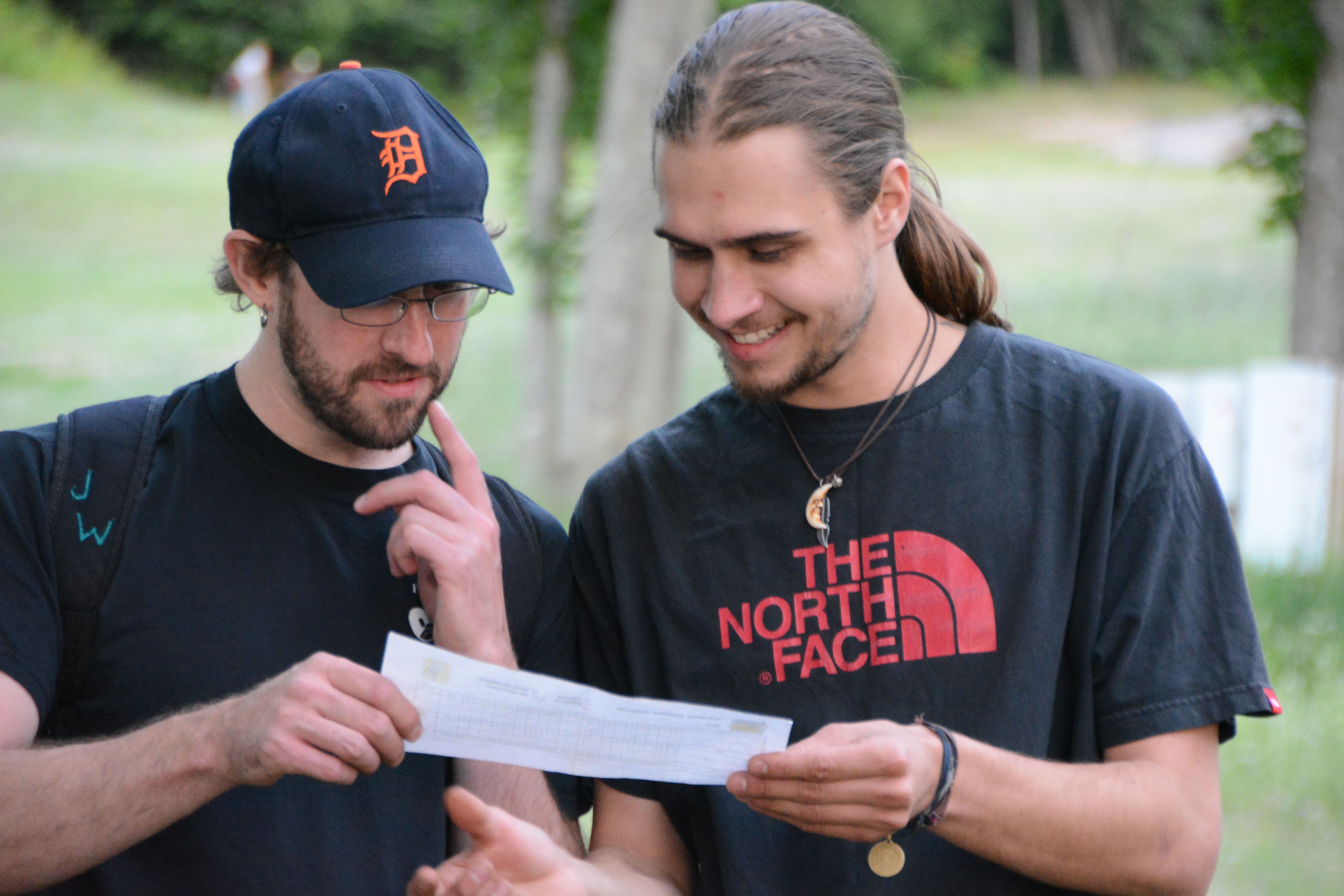 guys playing disc golf