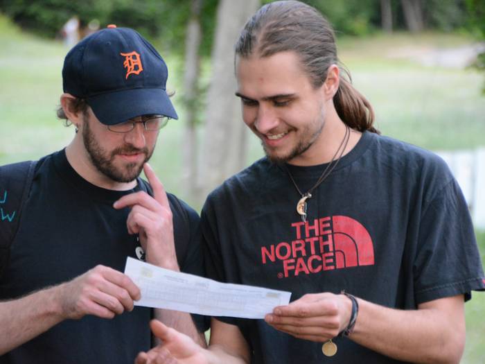 guys playing disc golf