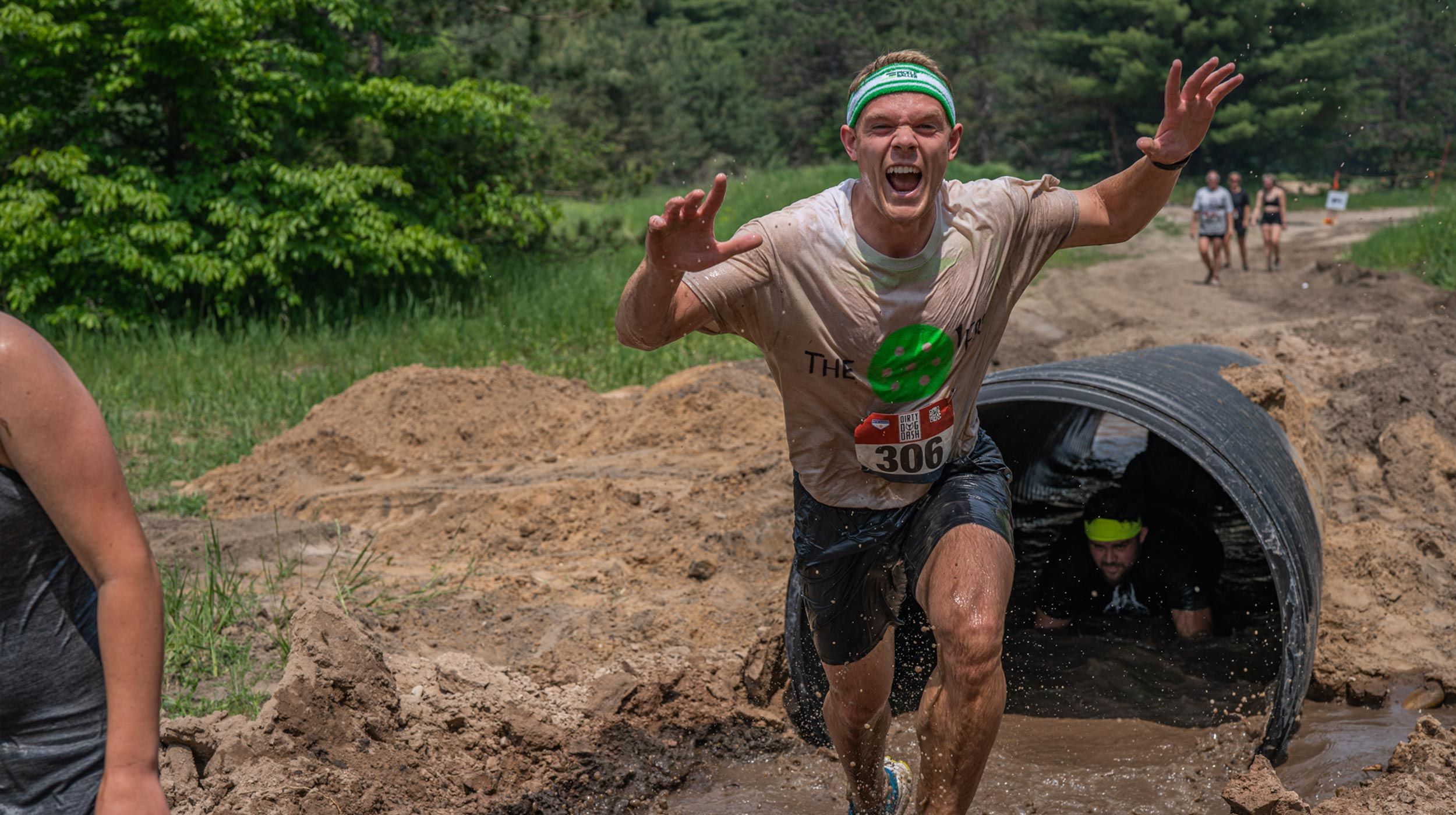 Guy with hands up yelling with excitement 