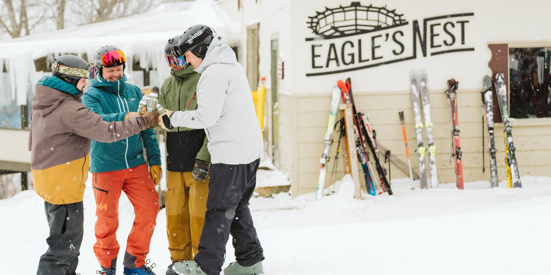 group of men at summit of mountain