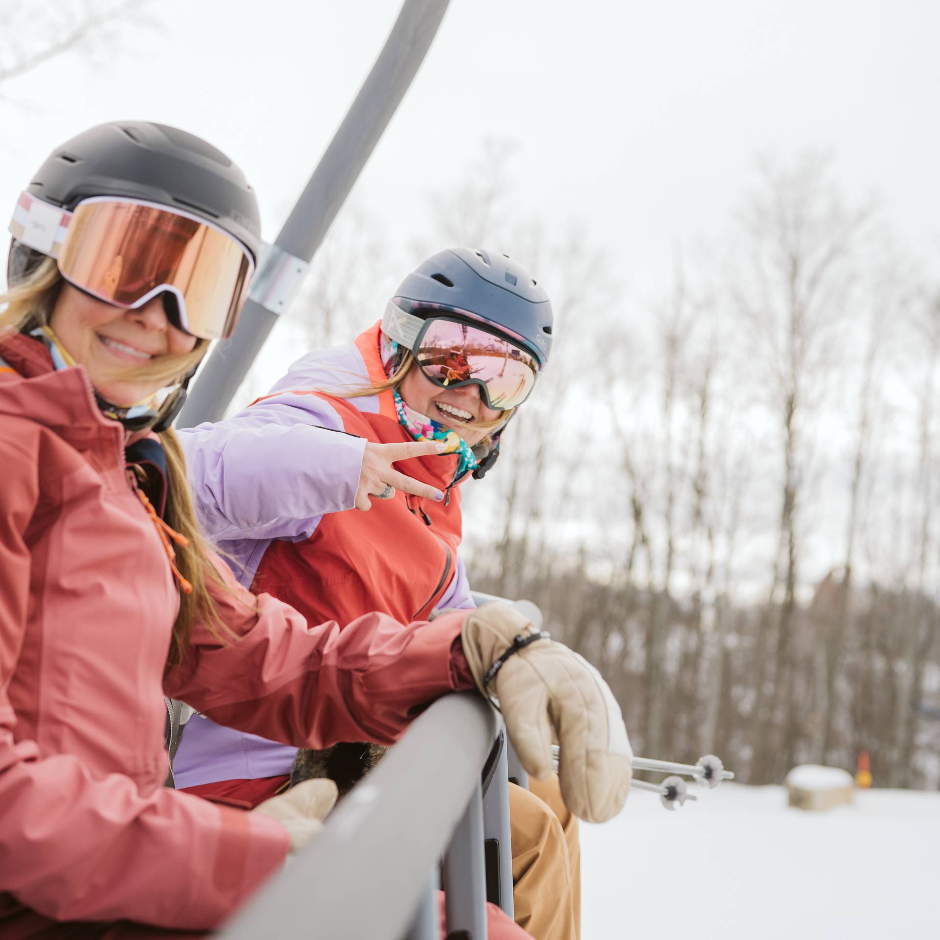 people riding chairlift