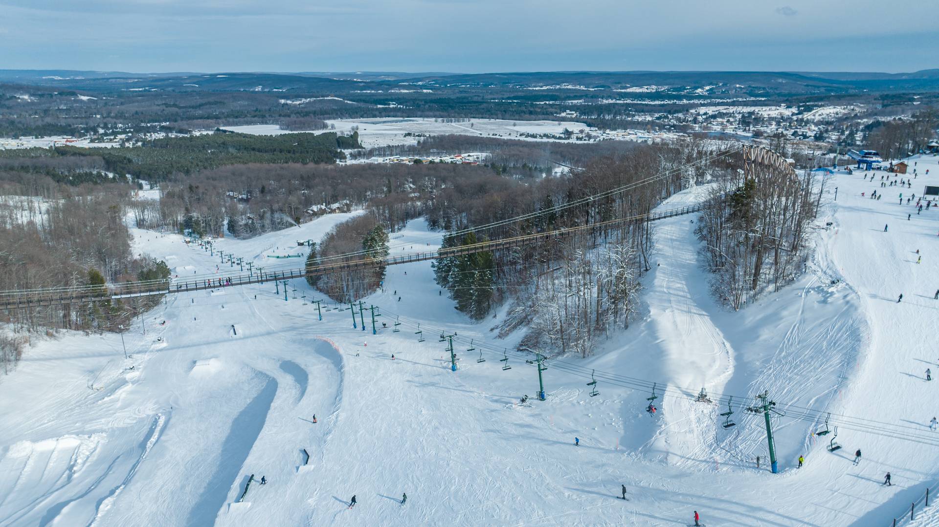 View of SkyBridge Michigan with Ski hill below