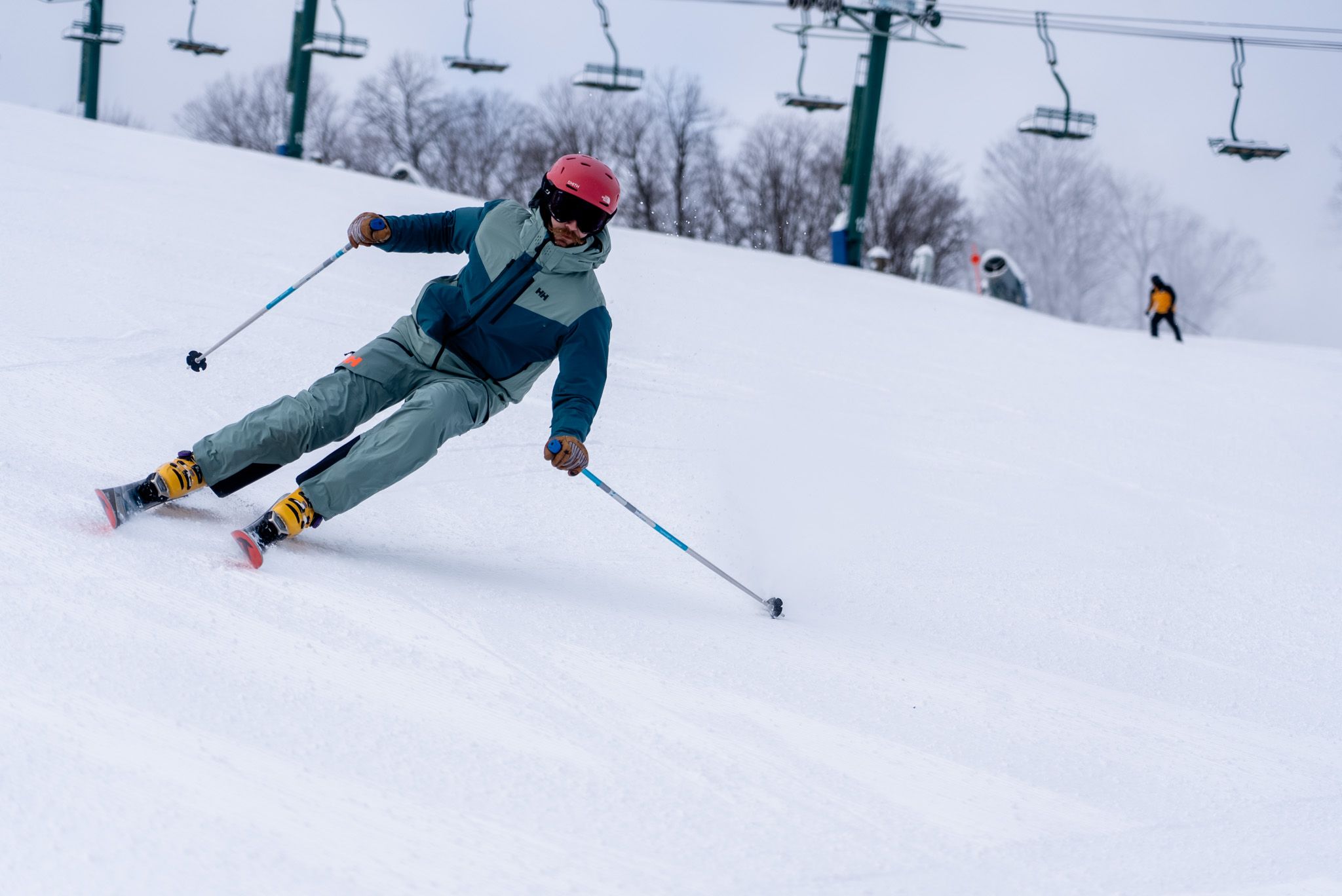man skiing down hill
