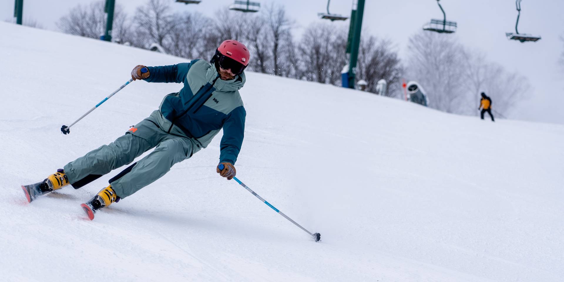 man skiing down hill