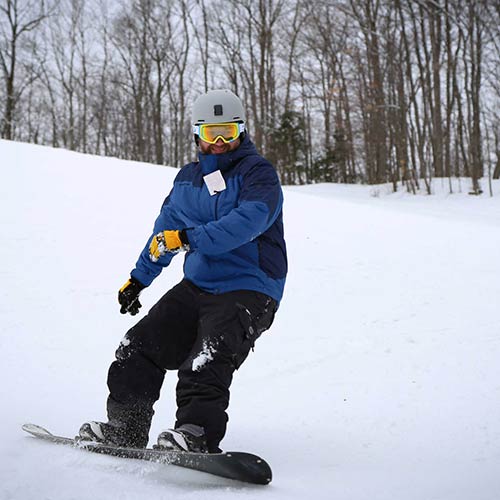 Boarder hitting jumps on Chmielew-Ski