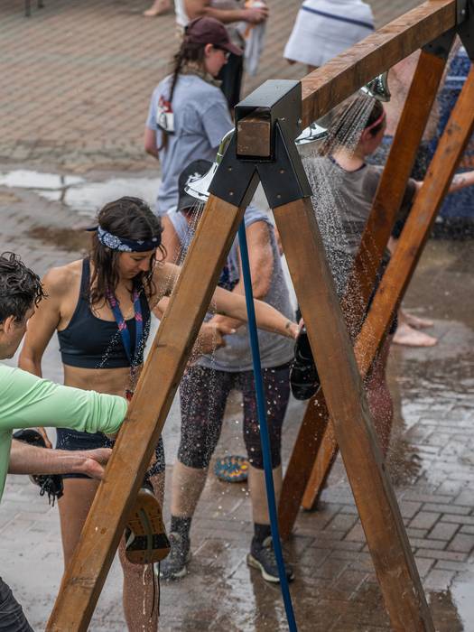 racers showering after dirty dog dash