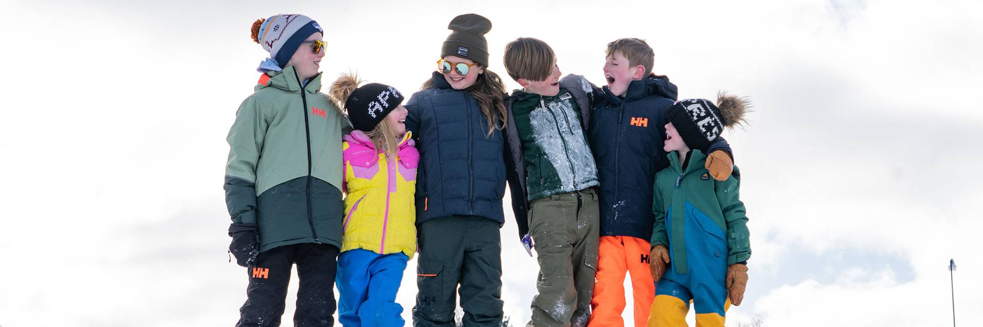 Kid's on a snow pile at Boyne Mountain