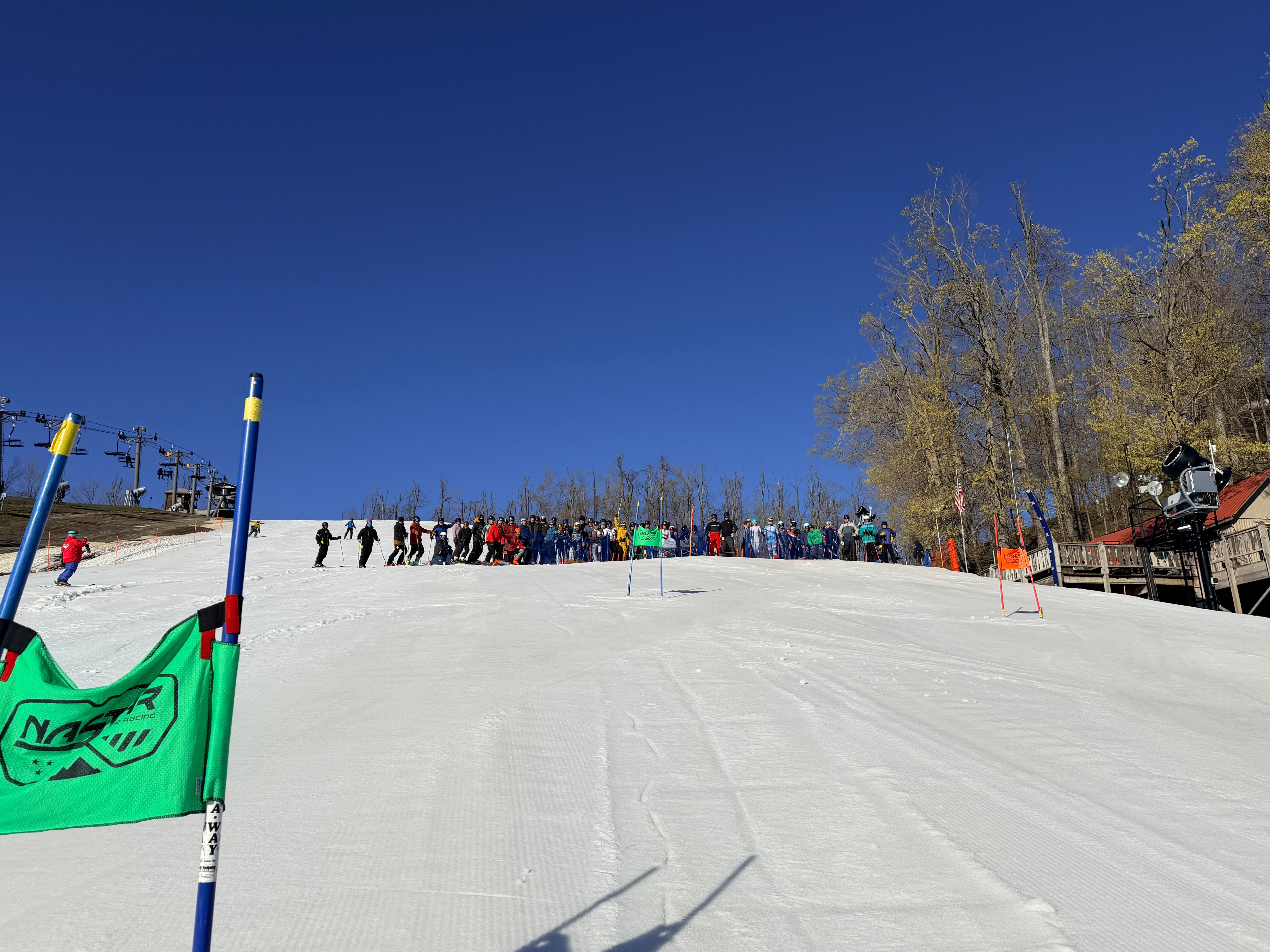 Group of Hemlock Open participants in front of Slalom Ski Race course