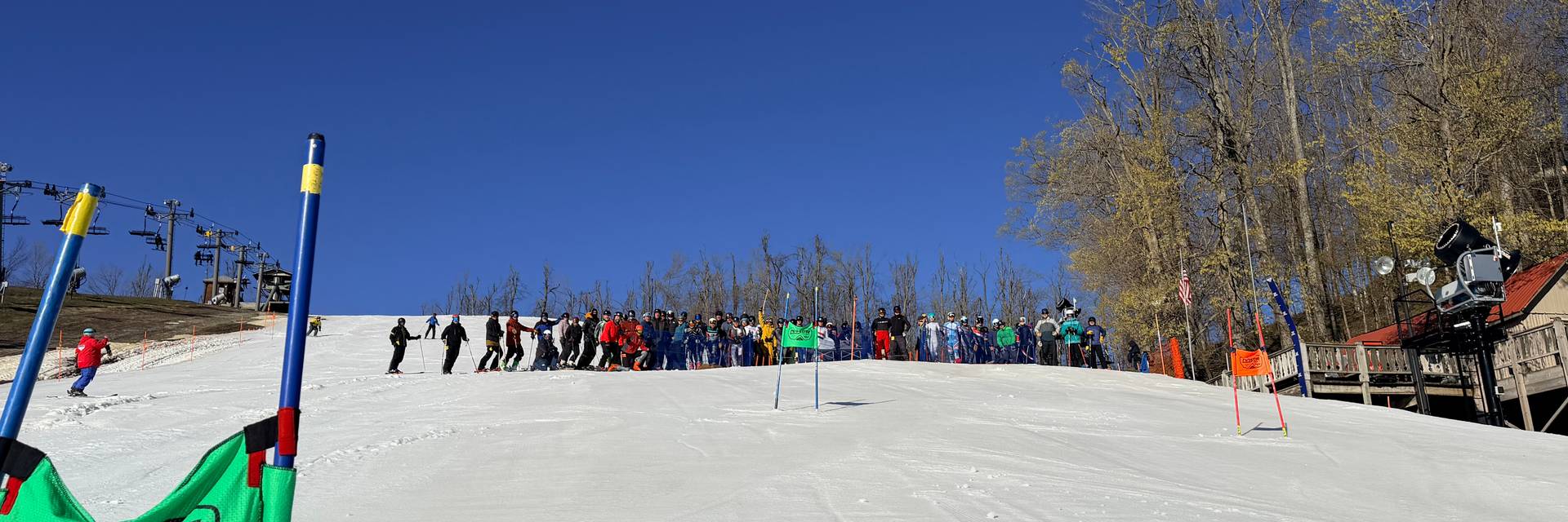 Group of Hemlock Open participants in front of Slalom Ski Race course