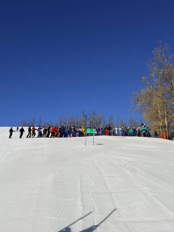 Group of Hemlock Open participants in front of Slalom Ski Race course