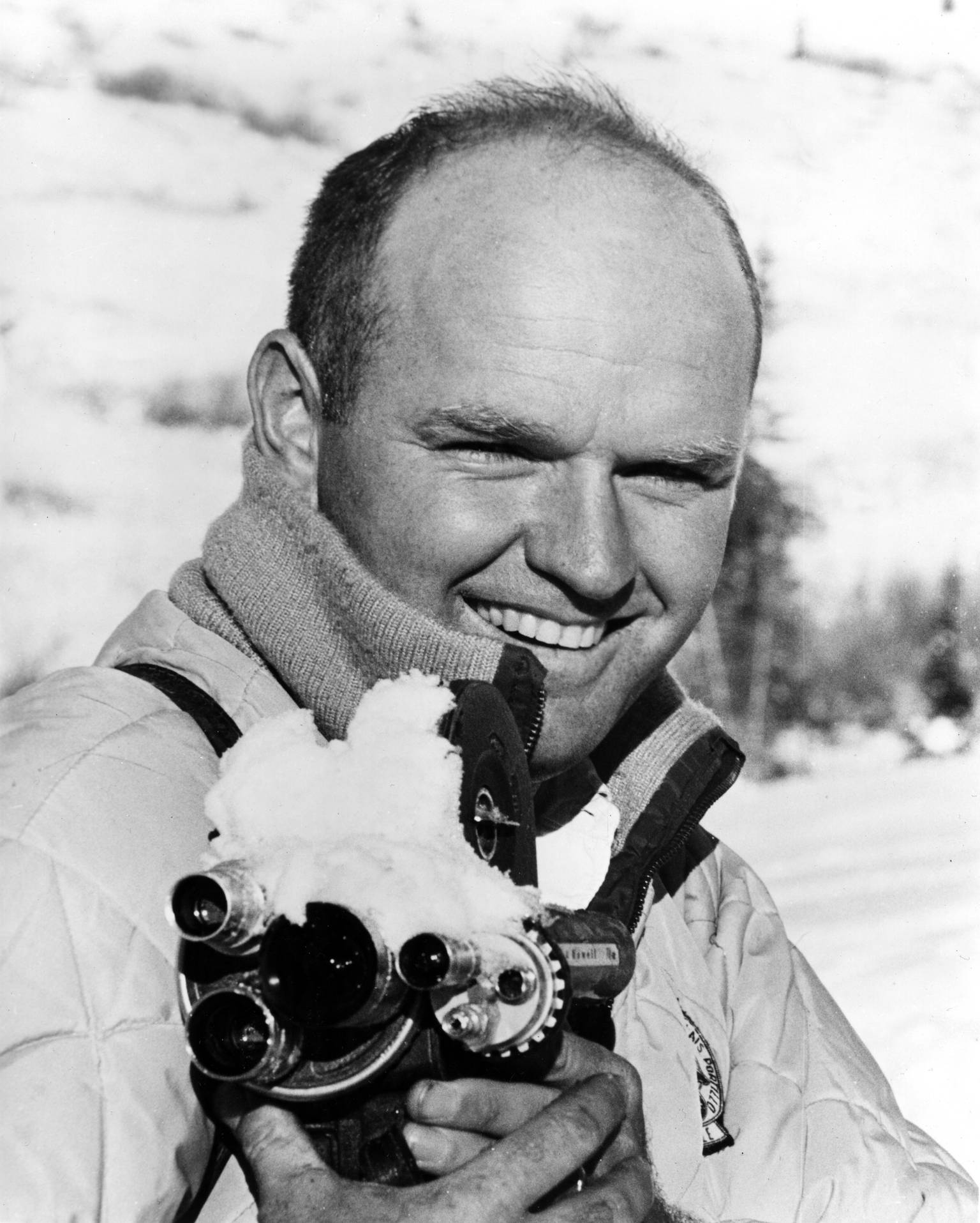Archive photo of Warren Miller with a film camera