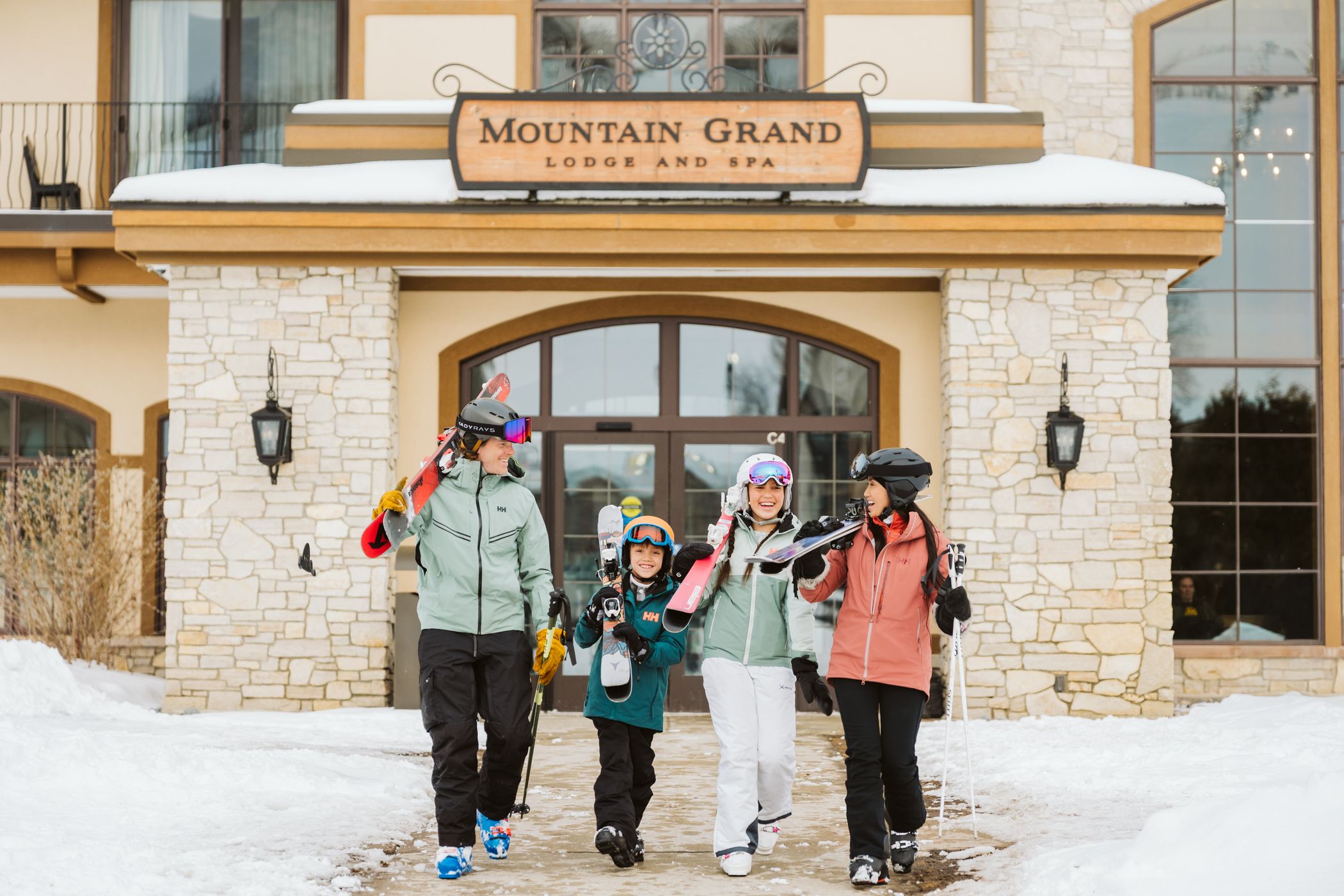 family walking from lodge