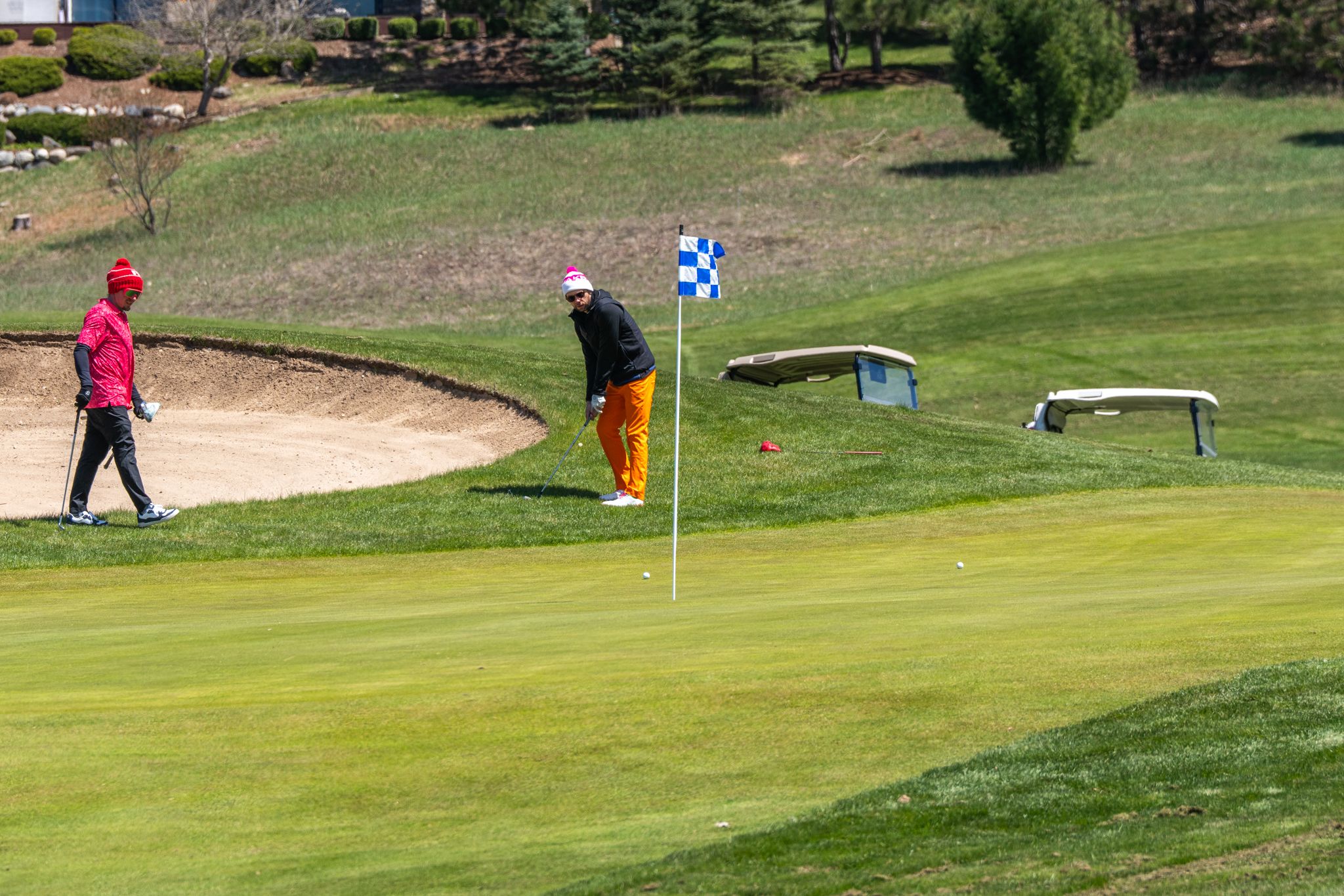 guy putting on golf course