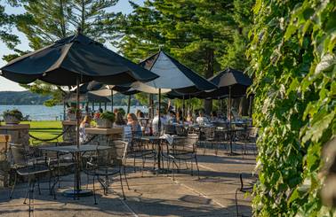guests on beach house patio in the summer