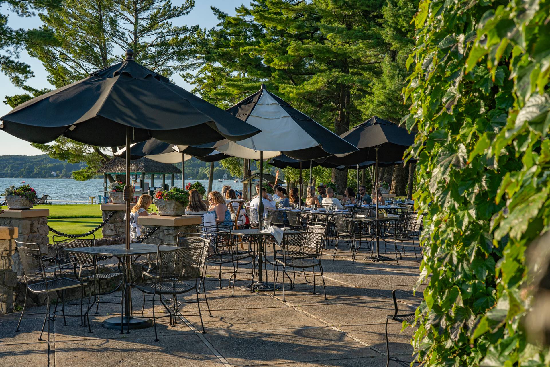 guests on beach house patio in the summer