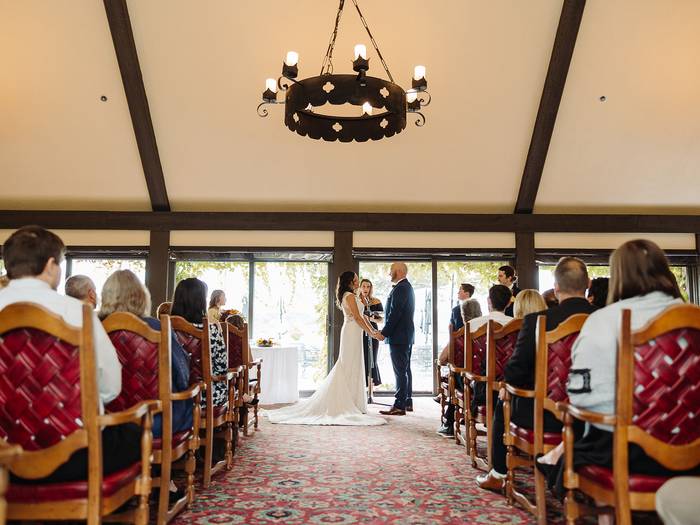 couple having there ceremony in the Beach House