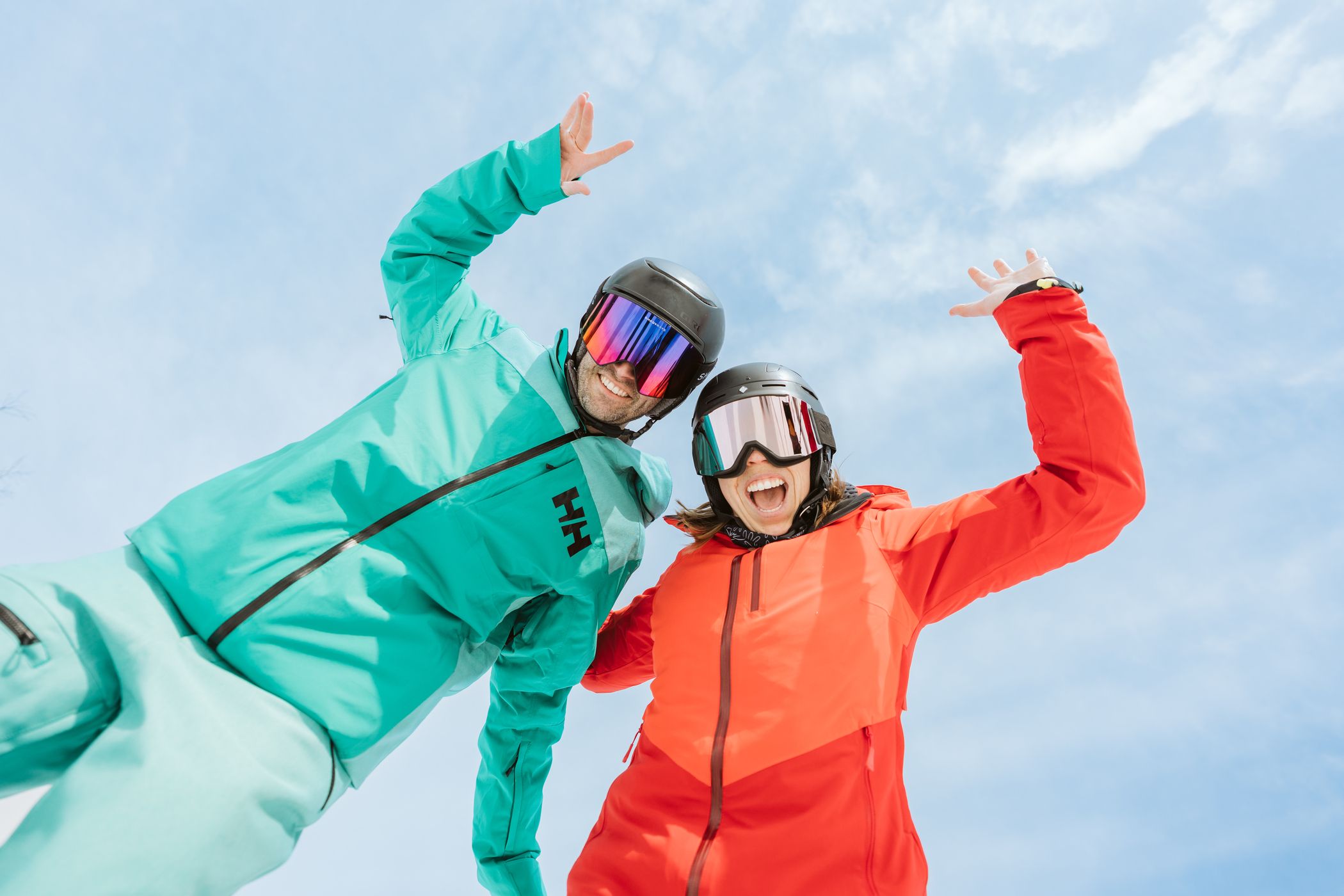 two skiers rejoicing