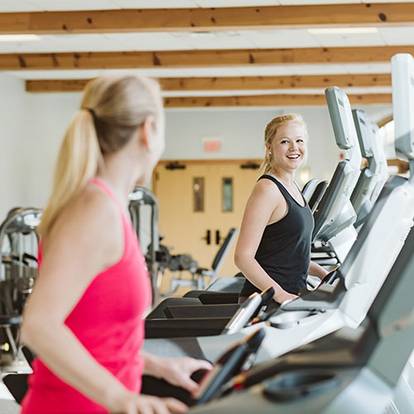 Girls on treadmills at the fitness center at The Spa at Boyne Mountain