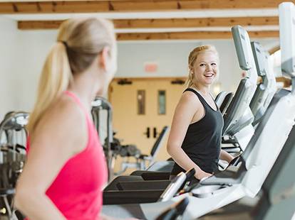 Ladies working our at the fitness center