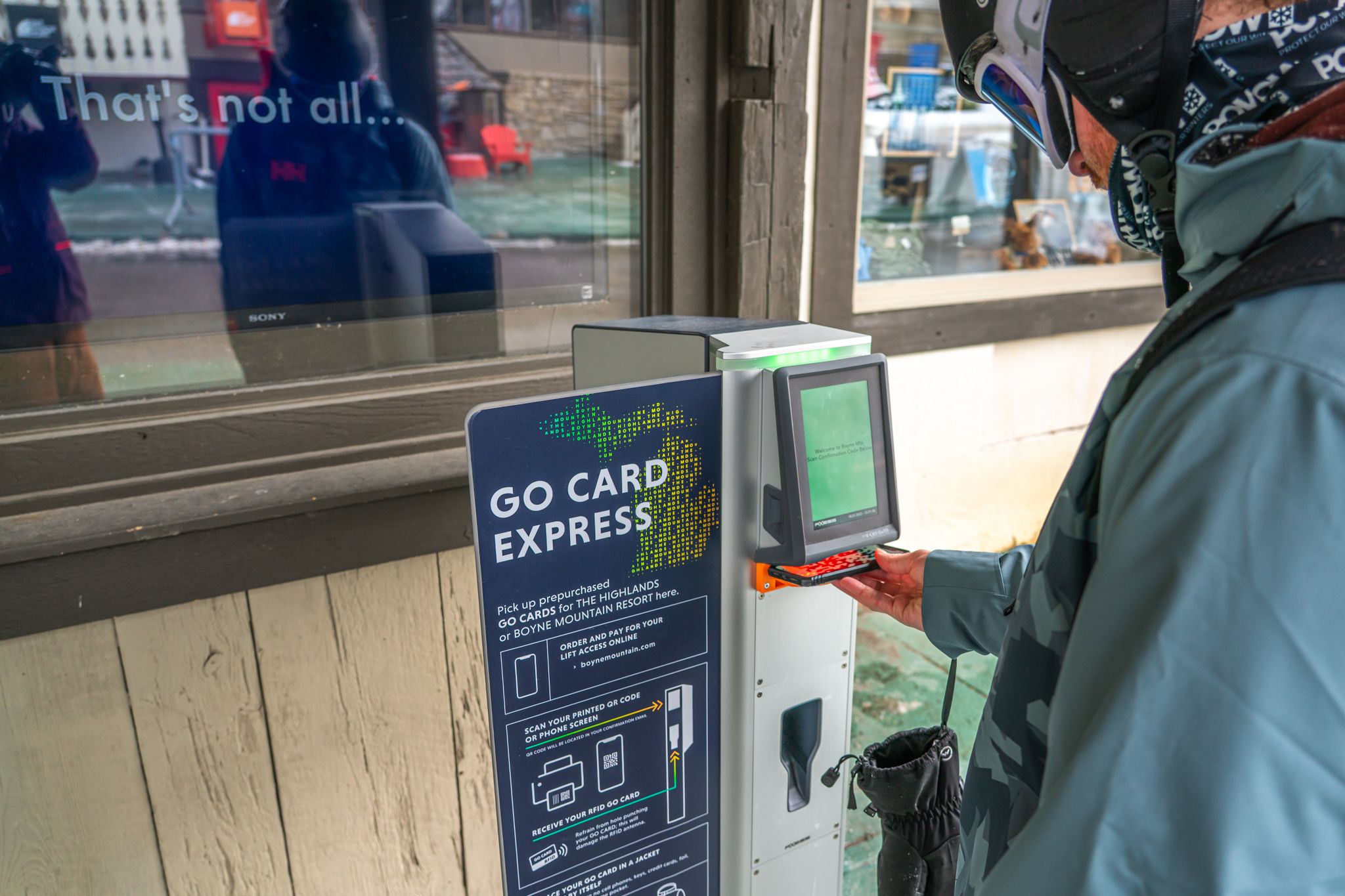 person scanning barcode at pick up box
