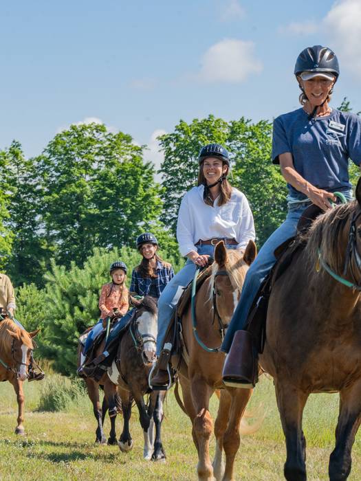 people riding horses