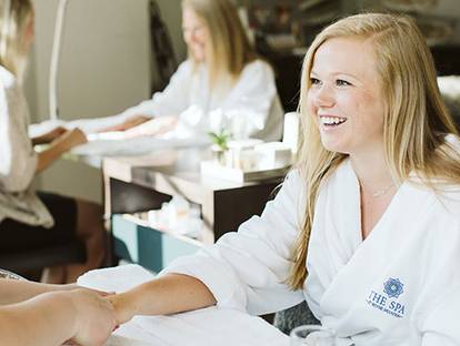 Woman getting her nails done at The Spa