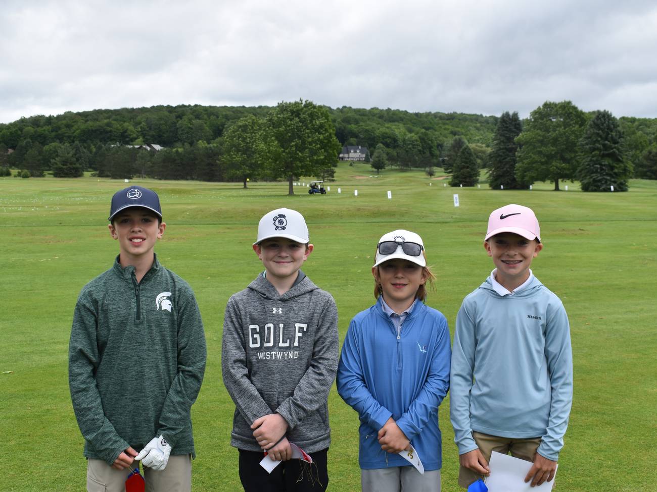 boys at Drive Chip & Putt at Boyne Mountain