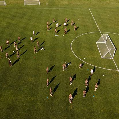 Soccer team playing at Boyne Mountain Sports Complex
